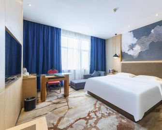 Ruiyi Hotel - Qinzhou - Slaapkamer