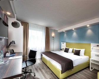 Peine Salzgitter Hotel by Belvilla - Peine - Bedroom