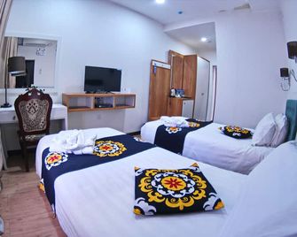 روهات هوتل - دوشانبي - غرفة نوم