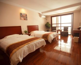 Greentree Inn Lianyungang Guanyun Bus Station Zhenxing Garden Express Hotel - Lianyungang - Habitación