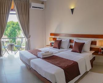 Hive 68 - Hotel and Resorts Negombo - Negombo - Schlafzimmer
