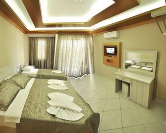 Flora Palm Resort - אולודניז - חדר שינה