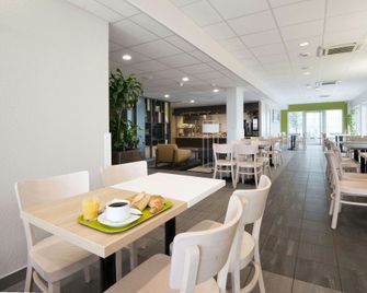 B&B HOTEL Lyon Sud Etats-Unis - Венісьє - Ресторан