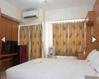 Apartemen Taman Melati Margonda by Winroom - Depok - Soverom