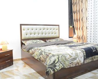 Jasmine leaves hotel apartment - Amman - Ložnice