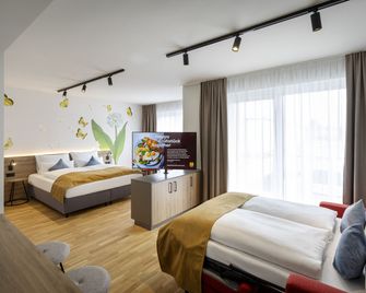 JUFA Hotel Bad Radkersburg - inkl 4h Thermeneintritt in Parktherme - Radkersburg - Bedroom