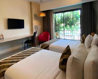 Grand Laguna Hotel & Villa - Kartasura - Habitación
