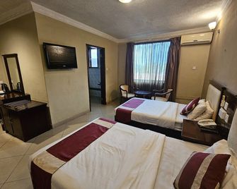 Bridgeview Hotel & Conference Centre - לילונגווה - חדר שינה