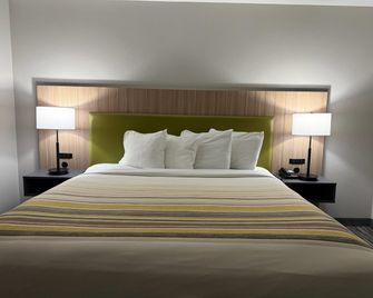 Country Inn & Suites Harrisburg@ Union Deposit Rd. - האריסברג - חדר שינה