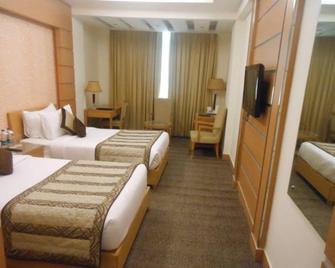 Hotel Saffron Kiran - Faridabad - Bedroom
