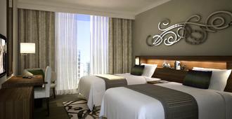 فندق بولمان دبي كريك سيتي سينتر ريزيدنسيز - دبي - غرفة نوم