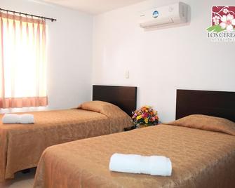Apartahotel Los Cerezos - Neiva - Habitación