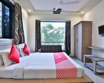 Flagship Hotel The Grand Pritam - Gandhinagar - Bedroom