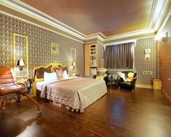 Holland Village Motel - טאינאן - חדר שינה