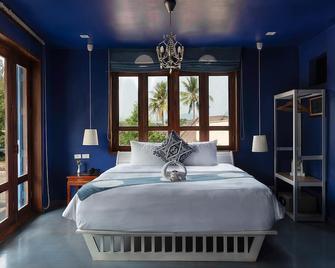 Indigo House Hotel - לואנג פראבאנג - חדר שינה