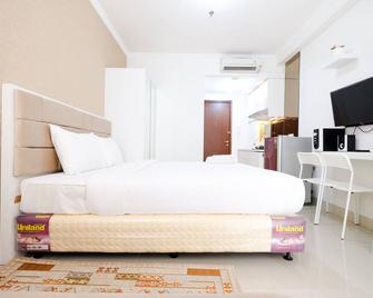 Studio Signature Park Grande Apartment Near Mt Haryono By Travelio - Jakarta - Schlafzimmer