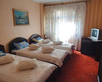 Pensiunea Crocus - Sauna & Billiard - Braşov - Bedroom