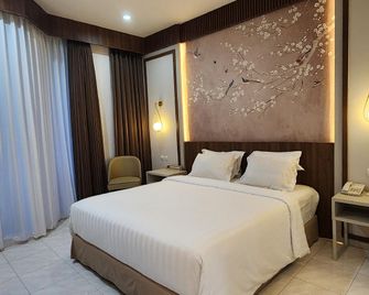 Hotel Sulawesi Jember - Jember - Bedroom