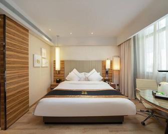 Echeng Hotel Qinzhou Bay Plaza East High-speed Railway Station - Qinzhou - Bedroom