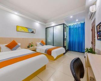 Bella Boutique Hostel - Haikou - Schlafzimmer