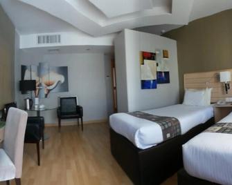 Crystal Hotel - Amman - Phòng ngủ