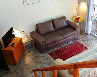 Suites on 74 - Worcester - Living room