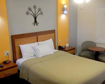FairBridge Inn & Suites Merced/Gateway to Yosemite - Merced - Sypialnia