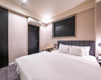 Daegu Sangindong Hotel Laurent - Daegu - Habitación
