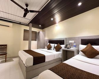 New Hotel Prince Palace - מומבאי - חדר שינה