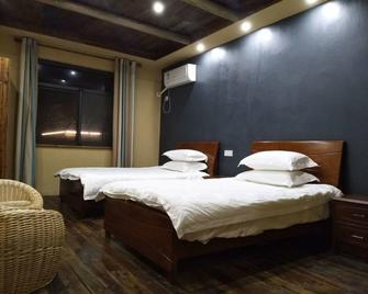 Moganshan Yufulou Hostel - Huzhou - Schlafzimmer