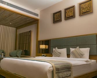 Hotel Hirisa Unit Of Hotel Fortune Palace - Jamnagar - Schlafzimmer