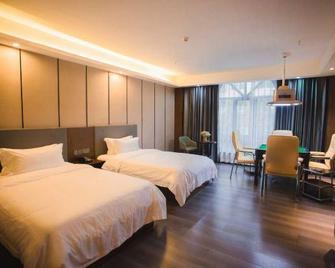 Wenxin 99 Business Hotel (Yichun Shanggao) - Yichun - Habitación