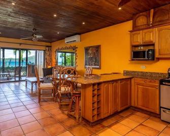 Warm Interiors and Orange Hues on Ground Floor in Front of Beach - Playa Flamingo - Comedor