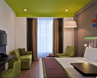 بارك إن باي راديسون أمريتسار أيربورت - امريتسار - غرفة نوم