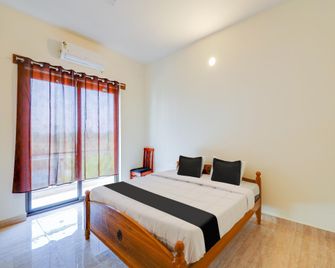 Hotel O Continental Bay Inn - Thiruporur - Habitación