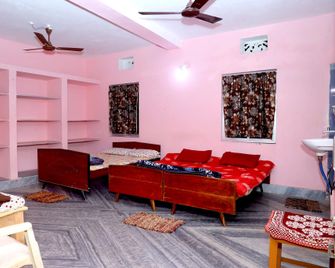 Trinath Holiday Home - Puri - Bedroom