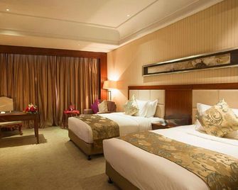 Jiarun Gloria Grand Hotel - Chizhou - Bedroom