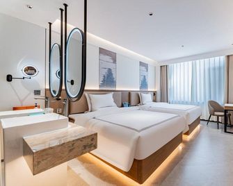 Amegava Designer Hotel - Baotou - Bedroom