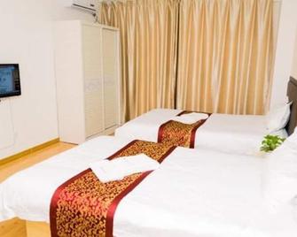 Weihai Dushang Huayi Apartment Hotel - Weihai - Habitación
