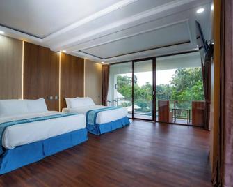 Nirvana Hotel Resort Tetebatu - Tetebatu - Bedroom