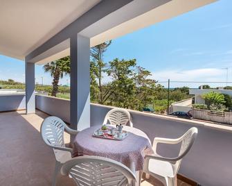 Villa Spiaggia degli Angeli - Punta Prosciutto - Balcone