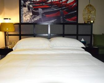 Qianyuan Xiangyu Hotel - Yanbian - Camera da letto
