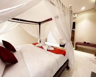 Bali 85 Beach Inn - Manggis - Slaapkamer