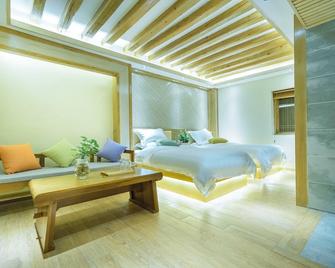 Glory of King Inn - Lijiang - Yatak Odası