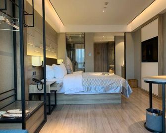 Morning Hotel (Hunan City University) - Yiyang - Slaapkamer