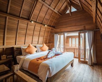 Andi Beach House - North Kuta - Schlafzimmer