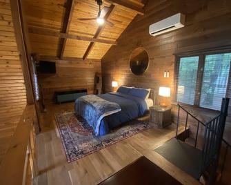A-frame cabin nestled in forest, stunning lake view, perfect serenity. - Allegan