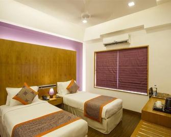 Medora Hotel by Rak Rooms - Kozhikode - Habitación