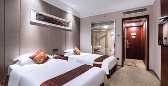 Nan Jiang Hotel - 柳州（リュウシュウ） - 寝室