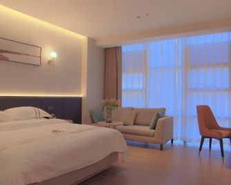 Hanzhong Liangju Hotel (Hanzhong High Speed Railway Station Central Hospital) - Hanzhong - Slaapkamer